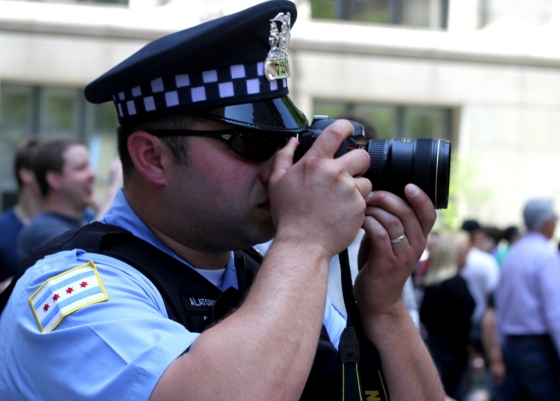 Police Officer Taking Picture